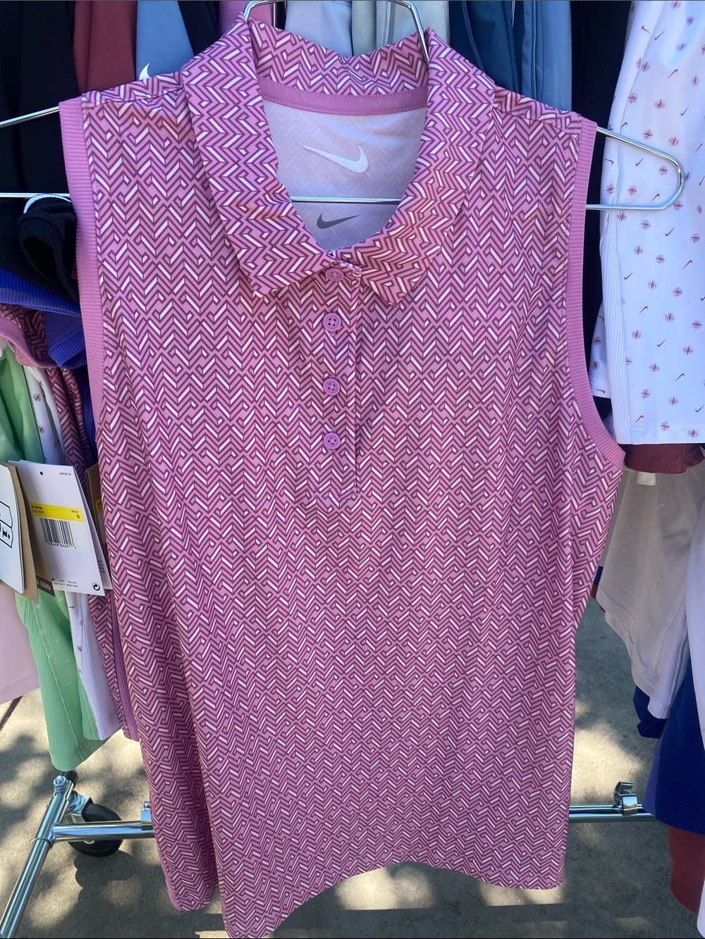 NWT Nike Women’s pink geo print Sleeveless Golf Polo with White Swoosh, small